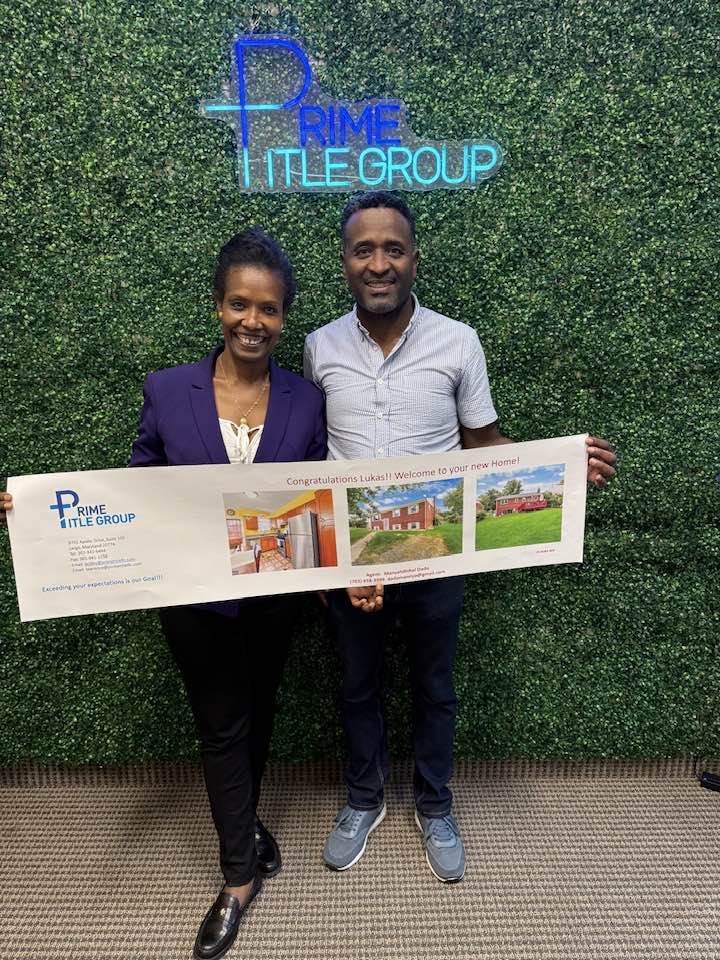 Manny Dado celebrating a closing with clients